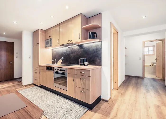 Andre Arnold - Boutique Affittacamere